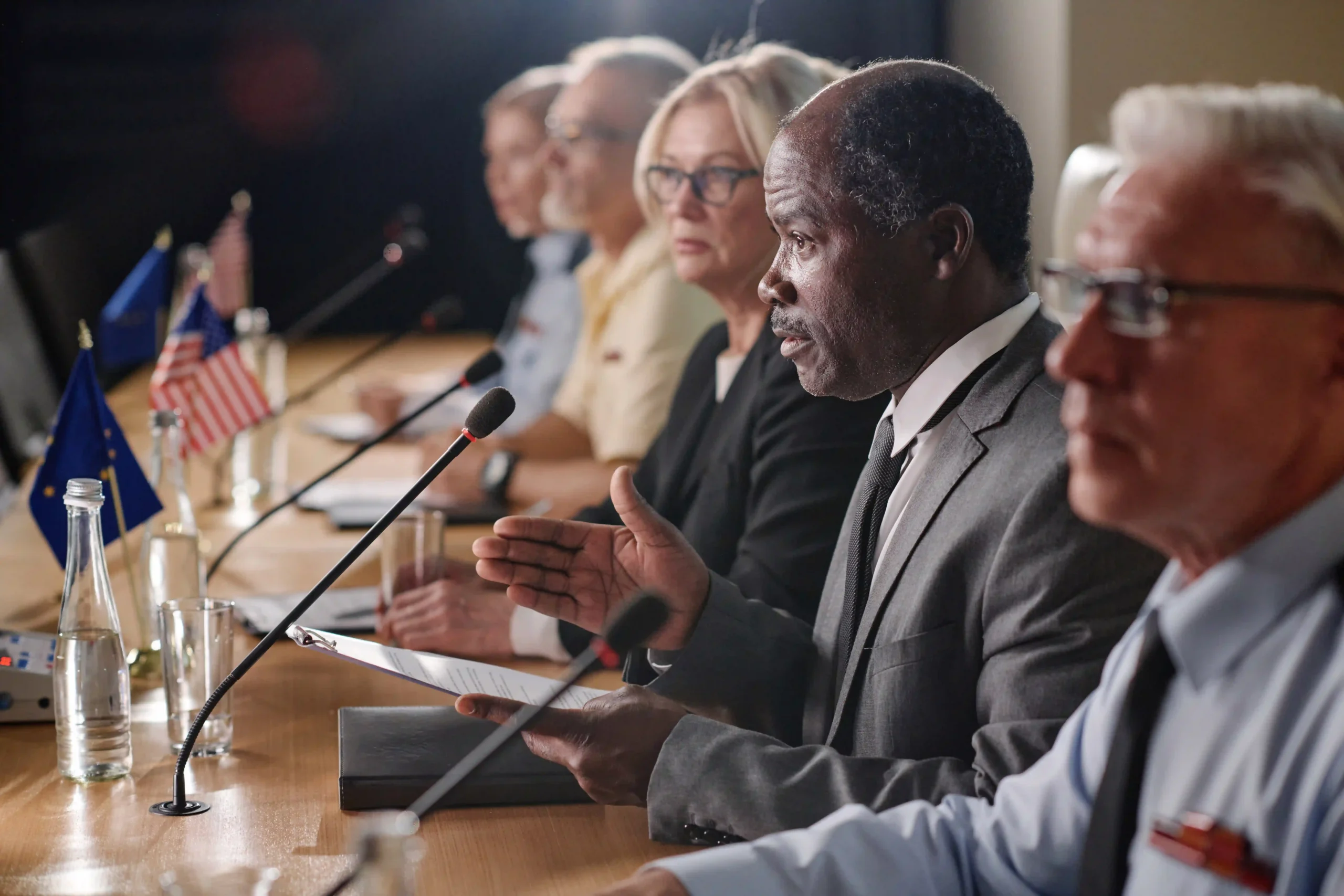 Global politicians and experts debating environmental regulations and EPA oversight – who oversees EPA.
