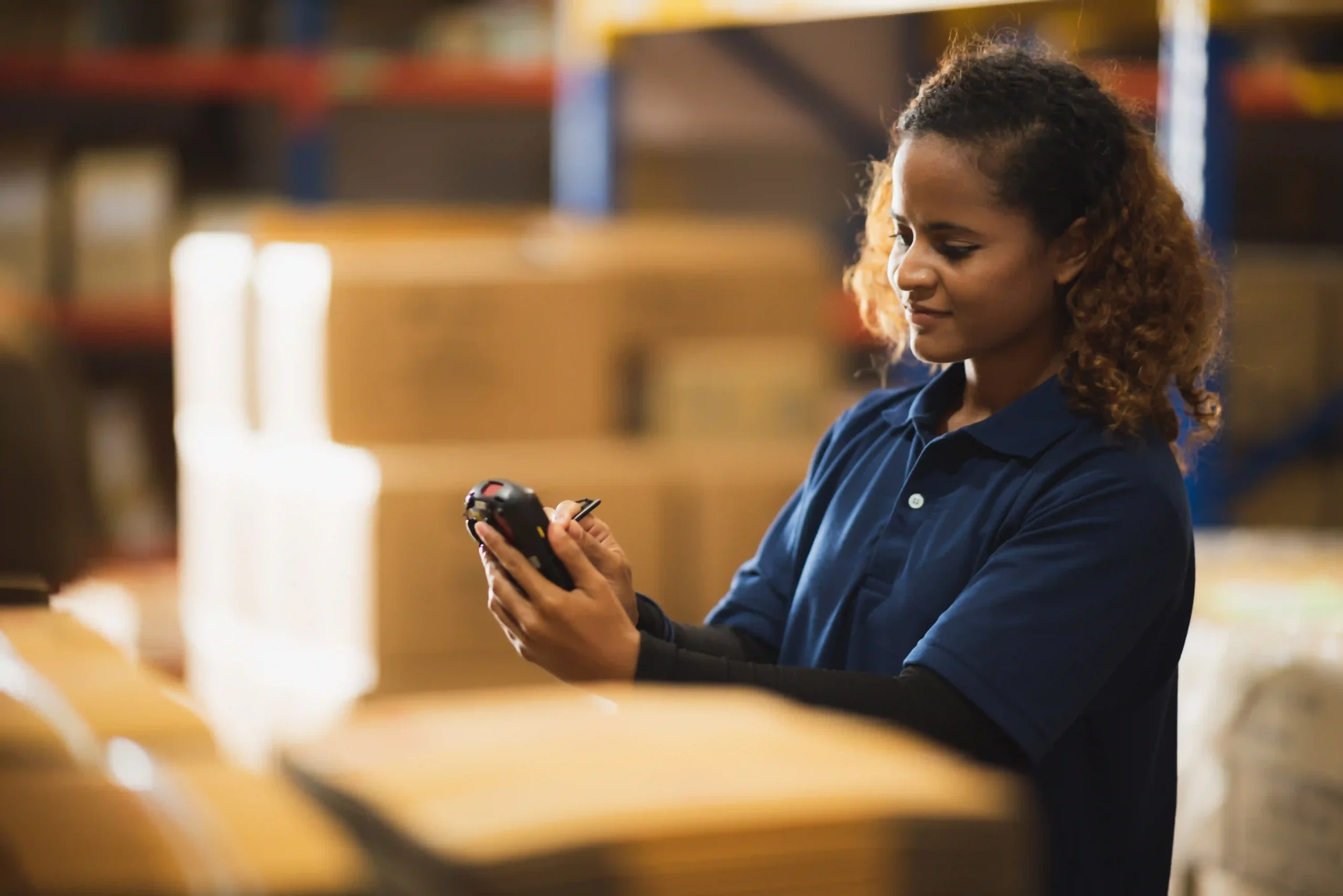 Employee tracking inventory with an order fulfillment app and barcode scanner