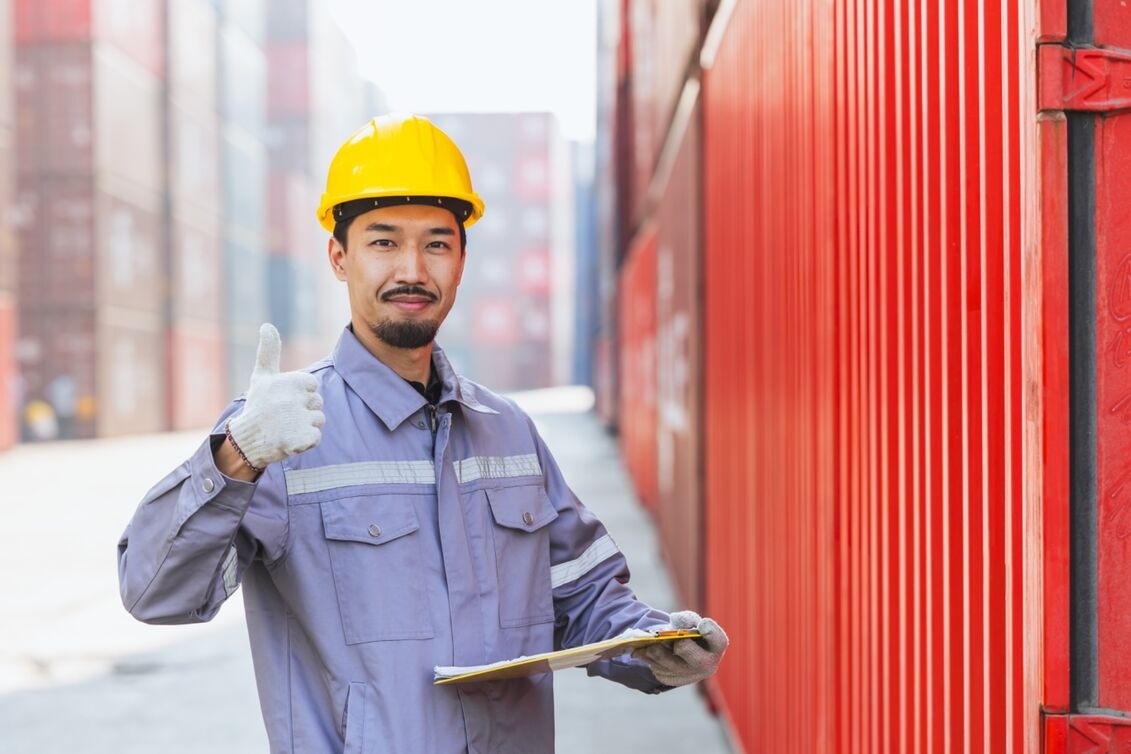 Engineer giving a thumbs-up after completing FTZ compliance checks.