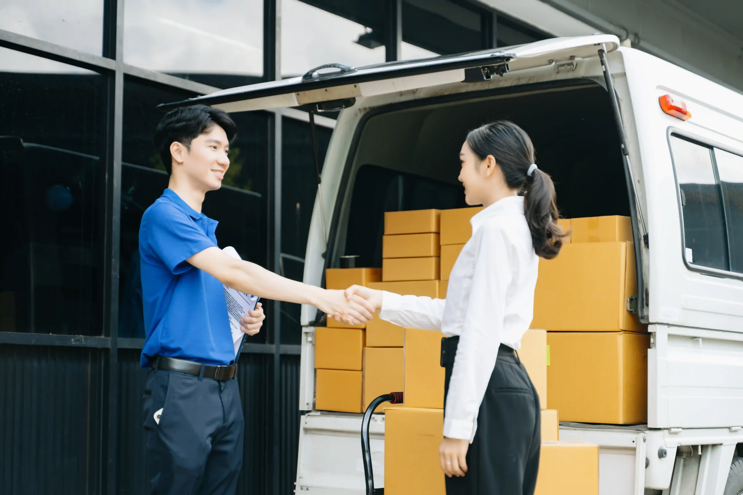 A courier completing a delivery through a reliable pick and ship service.