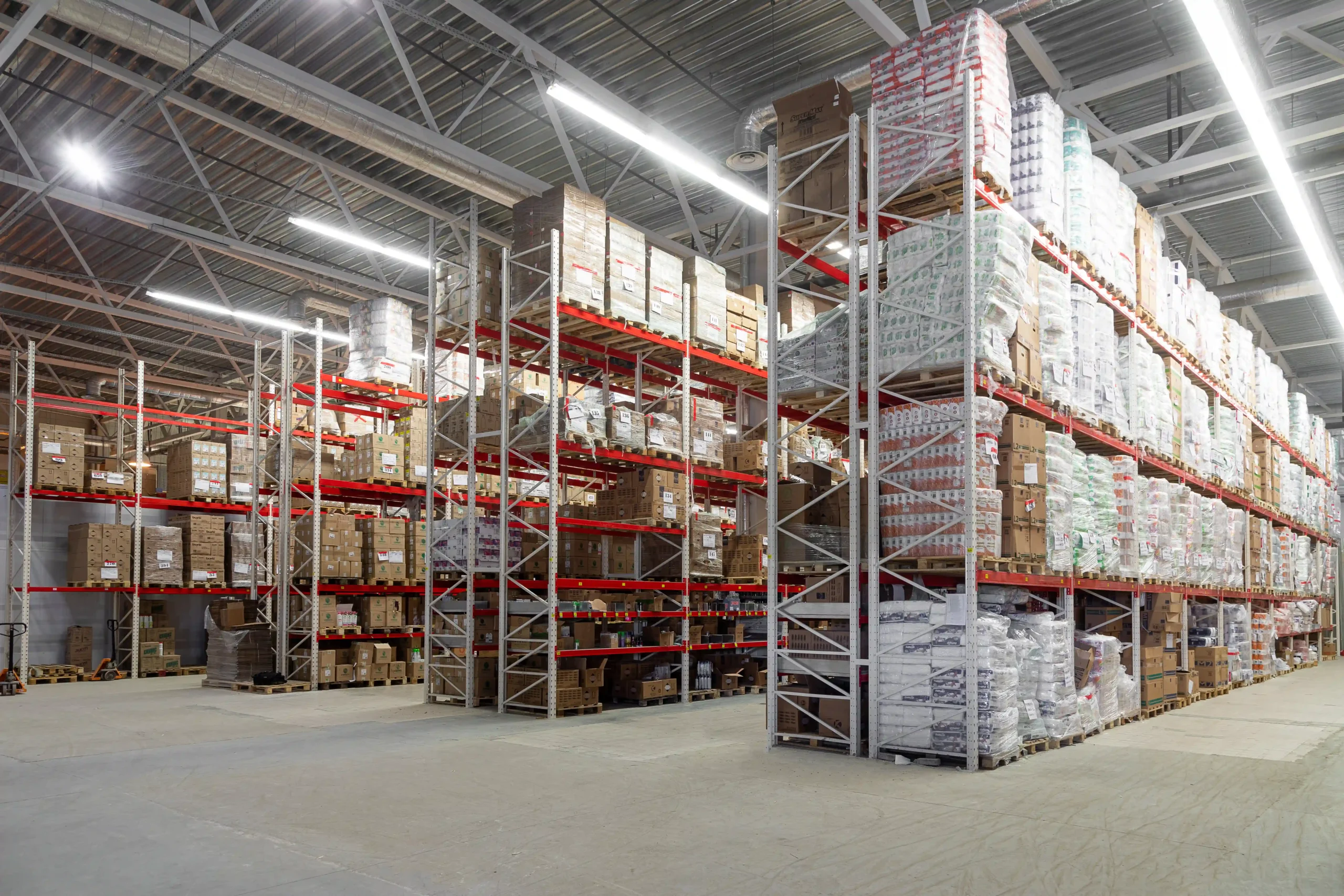 A large logistics warehouse equipped with high racks, designed for storing imported goods in a duty-free bonded facility.