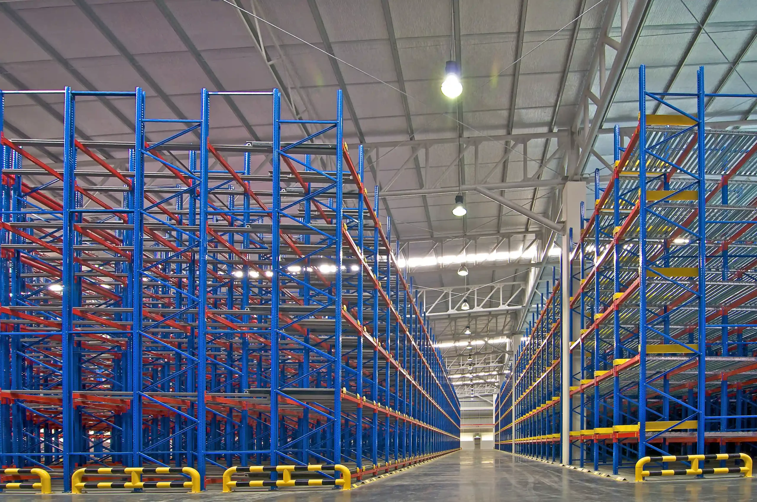 Tall metal racking system inside a bonded warehouse, providing structured storage solutions for international shipments.