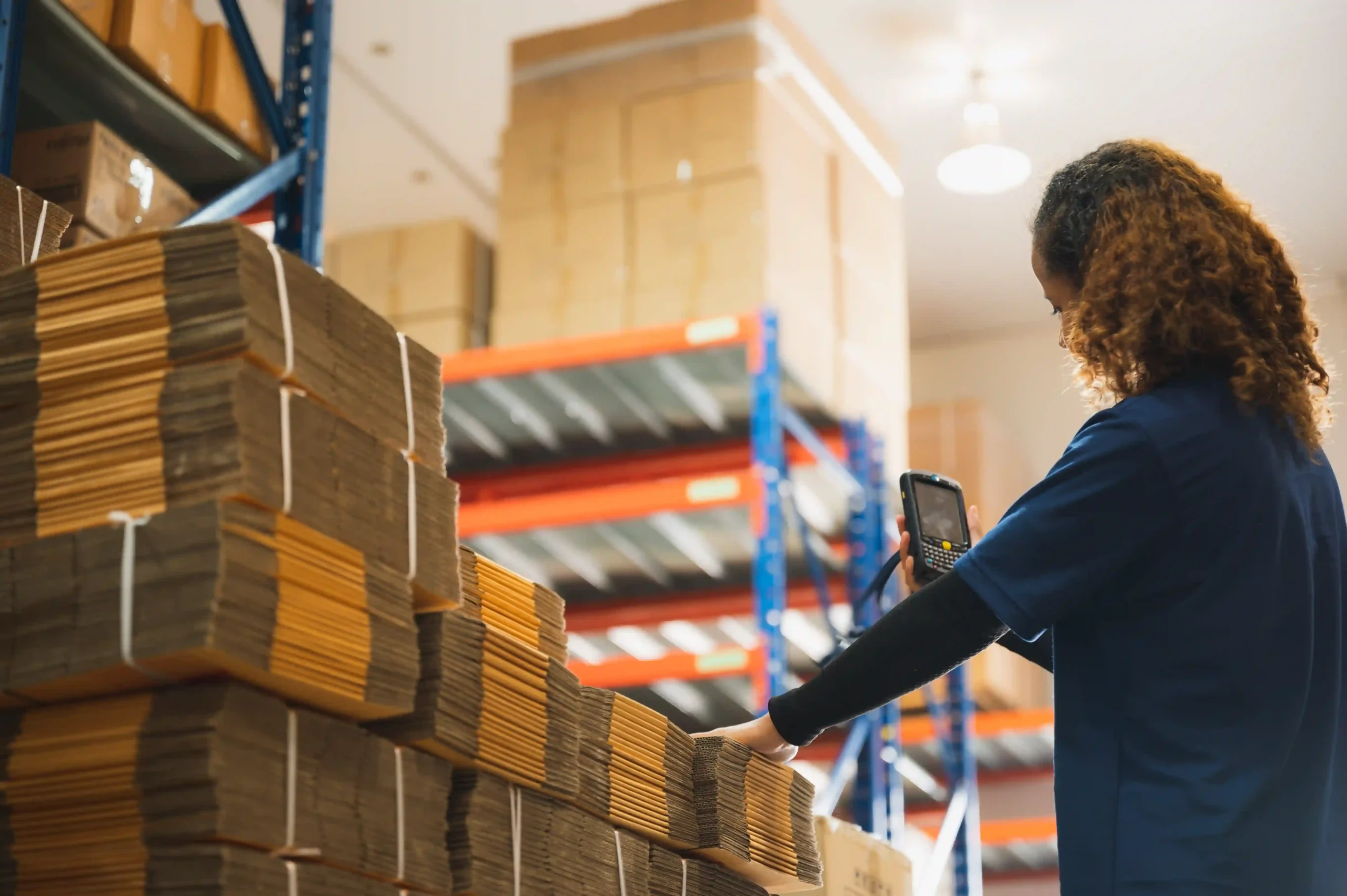 Inventory management explained through real-time barcode scanning in a modern warehouse